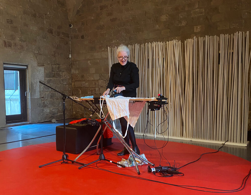 Margaret Schedel, performing Marzelline’s Confessions by Jocelyn Ho. MACBA Convent dels Àngels, Barcelona, International Symposium for Electronic Arts.